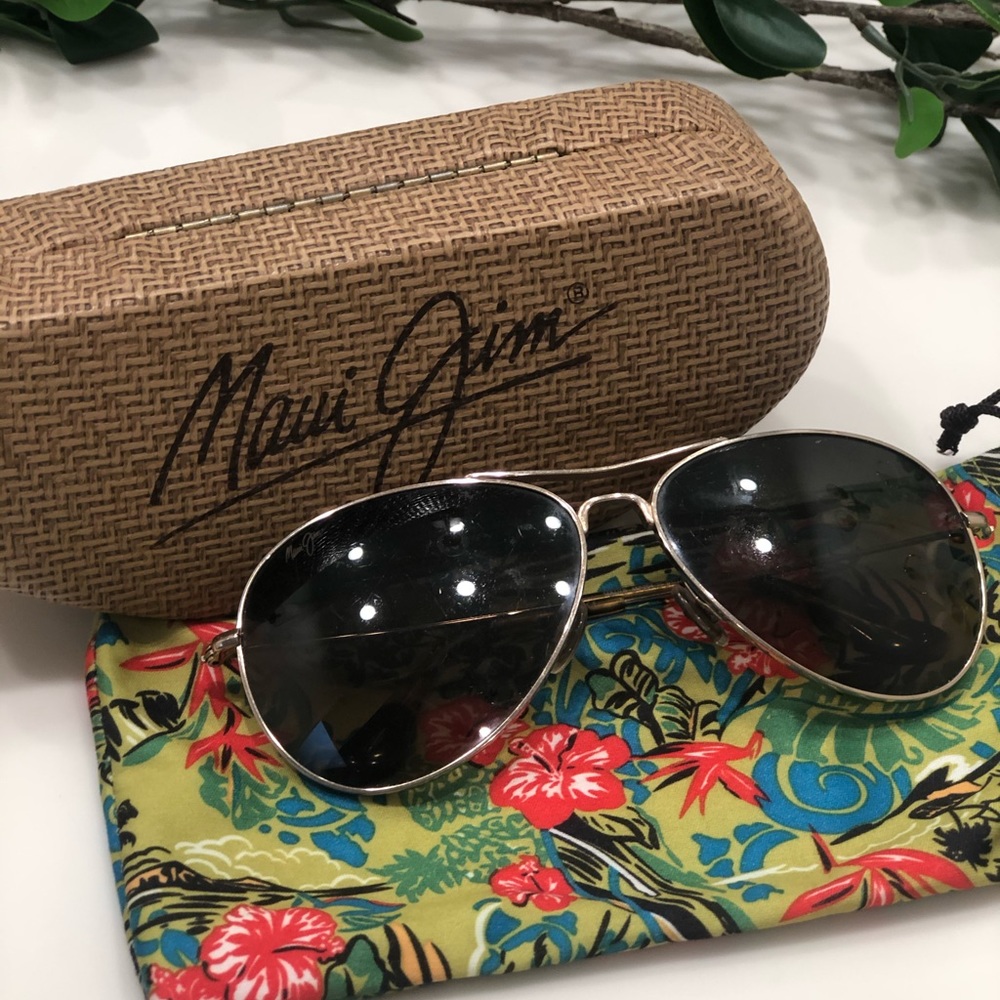 Maui Jim sunglasses , gold rimmed